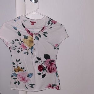 White, Pink, Yellow, Green and blue floral button up top from GUESS size small.